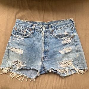 Vintage Levi’s 501 distressed jean shorts
